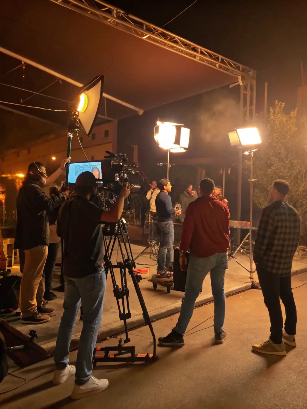 A behind-the-scenes image of a film set, showcasing the collaborative effort and technical expertise involved in producing a short film.